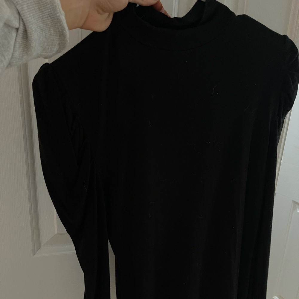Black puffer sleeve mock neck shirt